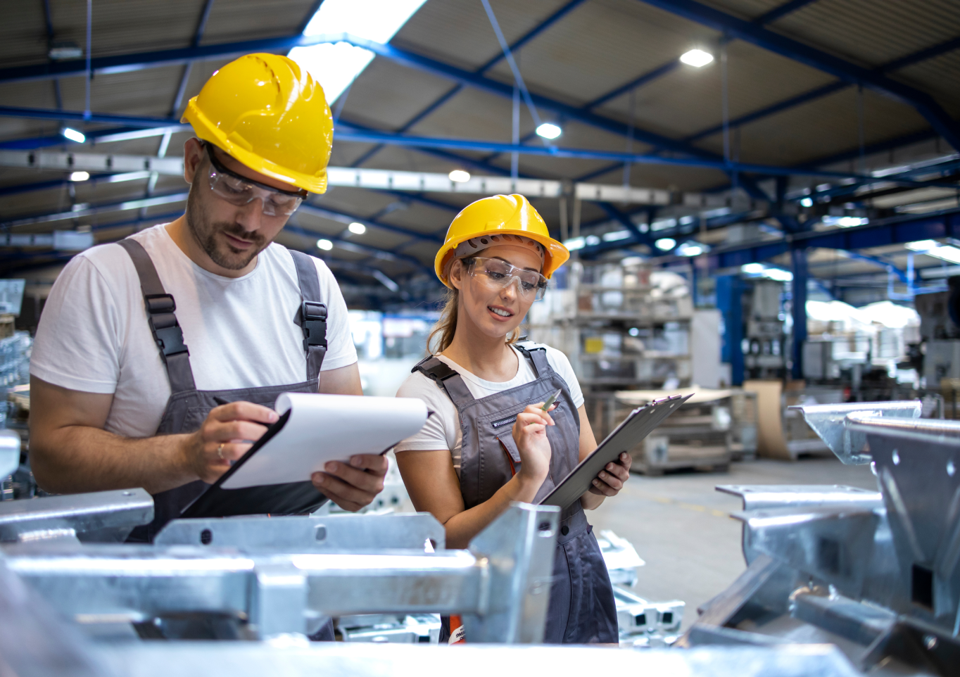 Industrial workers reviewing documentation